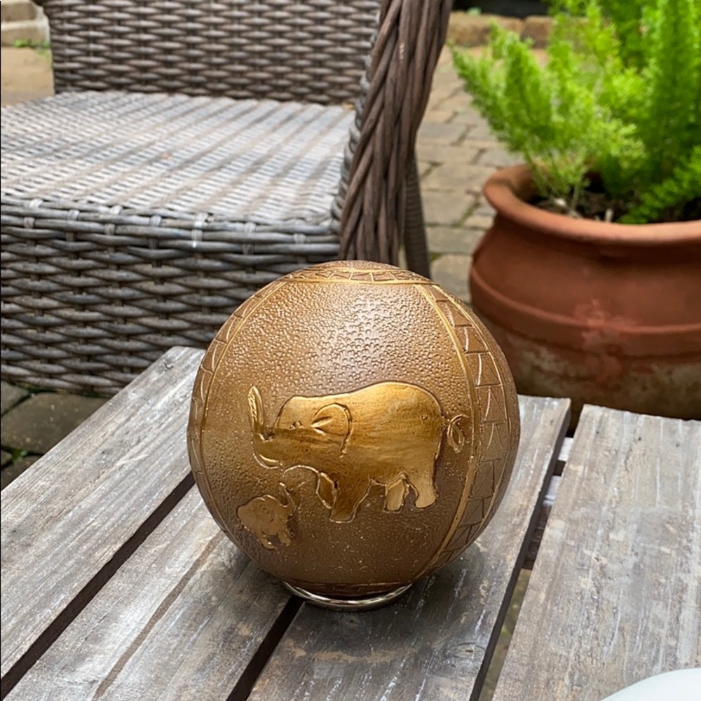 bronzy gold decorative ball w/elephants&palm trees